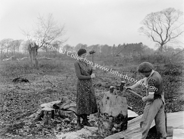 MAN & WOMAN CHOPPING WOOD